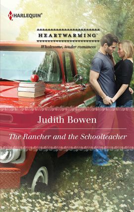 Cover image for The Rancher and the Schoolteacher